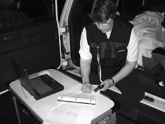 Barbara recording an observation in her notebook