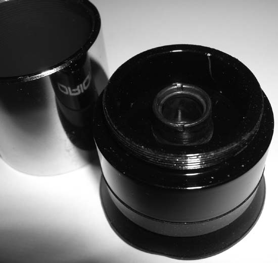 Remove the barrel from the Plössl eyepiece to reveal the field lens and field stop