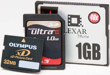 The tiny Secure Digital card (middle) is gaining popularity because you can use it in both your digicam and palmtop. The even tinier xD-Picture Card (left) works only with Fuji and Olympus cameras. The larger CompactFlash card is still the most common (especially in larger cameras).