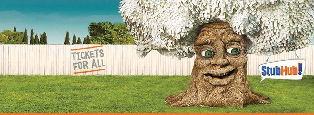 A StubHub advertisement showing a tree with a smiling face on the trunk. A dialog box on the right reads StubHub, and the fence behind the tree has the words Tickets for all.