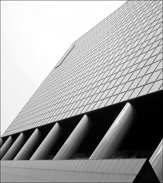 An aerial view of the exterior work of a skyscraper architecture building.