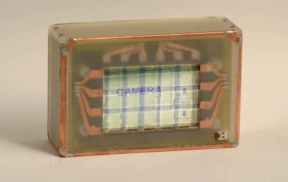 The "Bar of Soap" changes its functionality (from camera to PDA to phone to gaming device) based on how it is held, switching modes when rotated. Courtesy Brandon Thomas Taylor and MIT Media Lab.