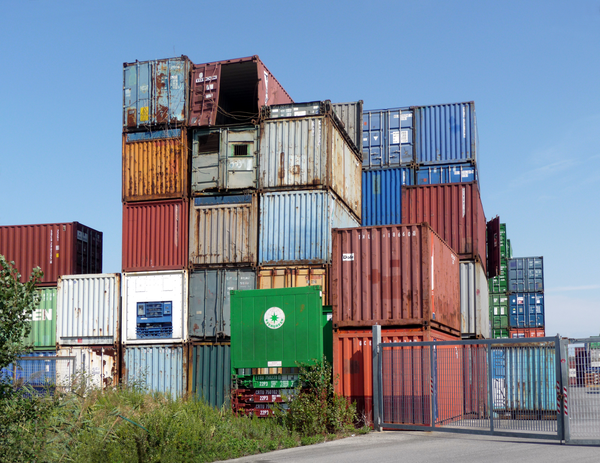 A crane lifting a shipping container