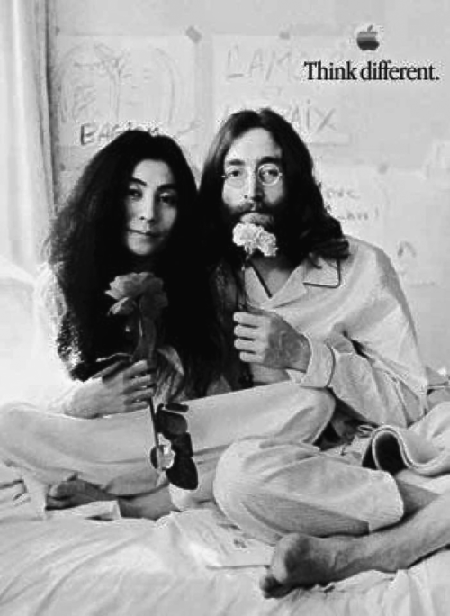 Figure representing an as for Apple depicting a photograph of John Lennon with Yoko Ono sitting on a bed holding flowers in their hands.