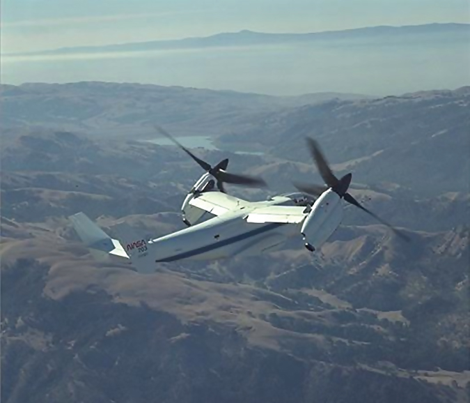 Photo of flying XV-15 research aircraft.