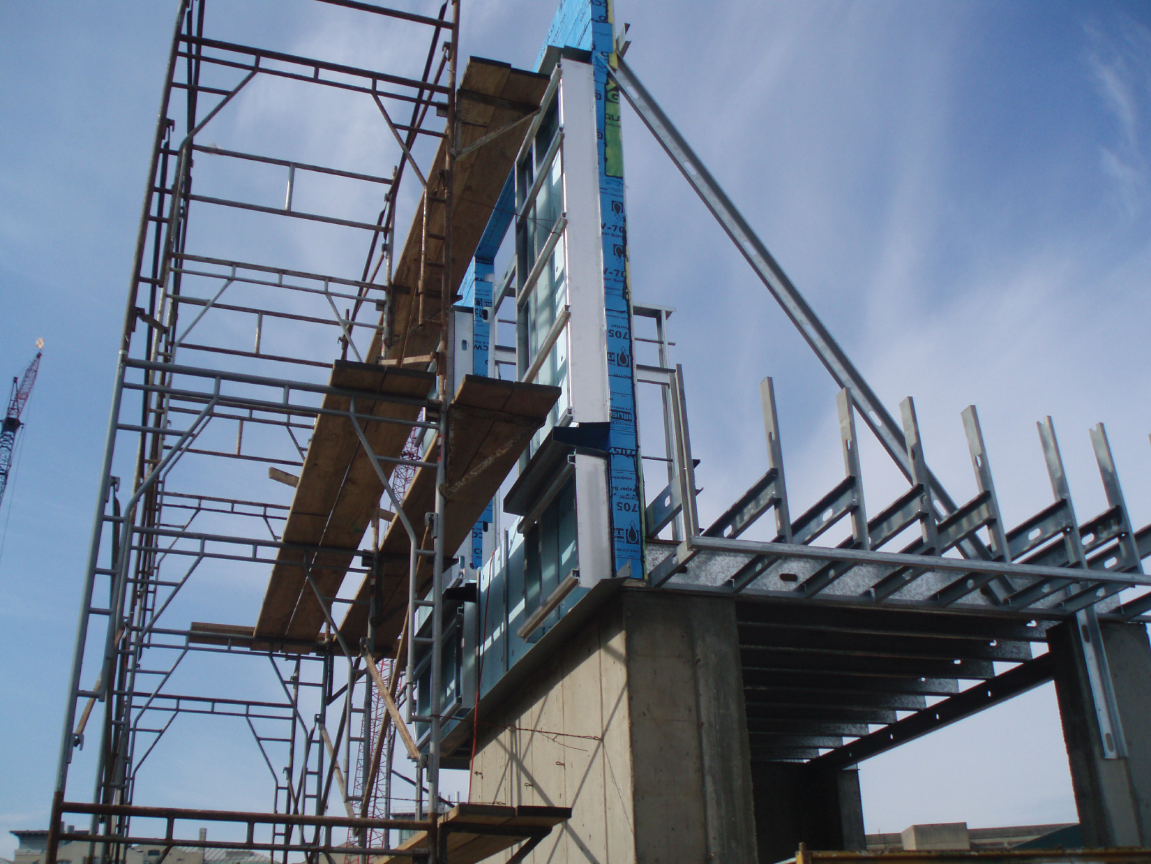 Photograph of a tall steel structure set up for a building project.