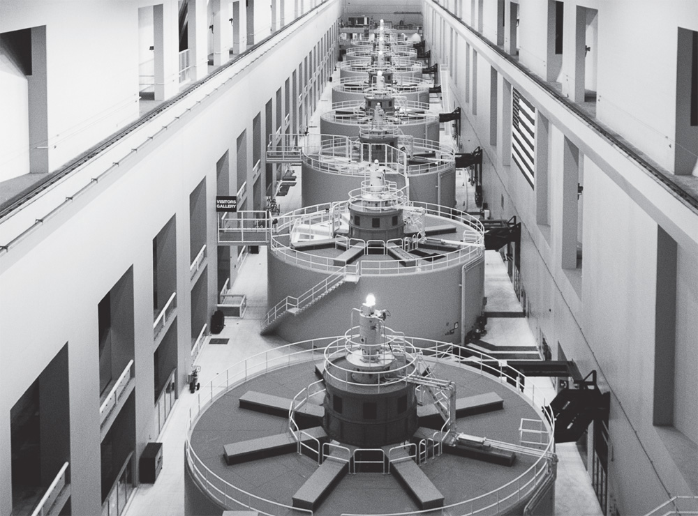 Photo depicts the Synchronous generators at Bonneville Dam and Power Plant on the Columbia River, Oregon.