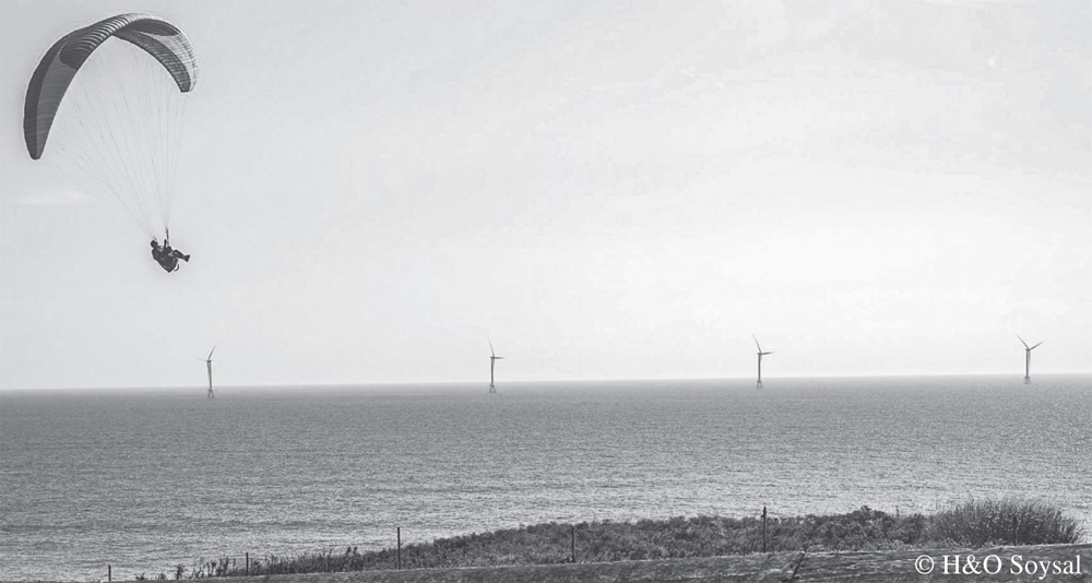 Photo depicts the view of first offshore wind farm in the United States from South of Block Island, RI.