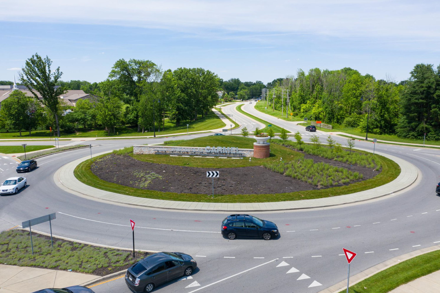 Photo depicts a roundabout in Carmel, Indiana.