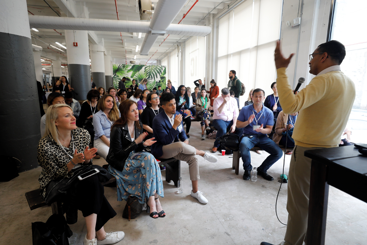 Photograph of mindfulness for Managing Stress and Work–Life Balance. Speaking and guiding a mindfulness workshop for an HR event in New York City.