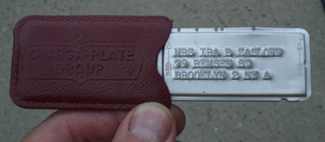 A charge plate belonging to Mrs. Ira B. Zasloff—note the stylish leather case! (courtesy of Ron Toth Jr., 2013)