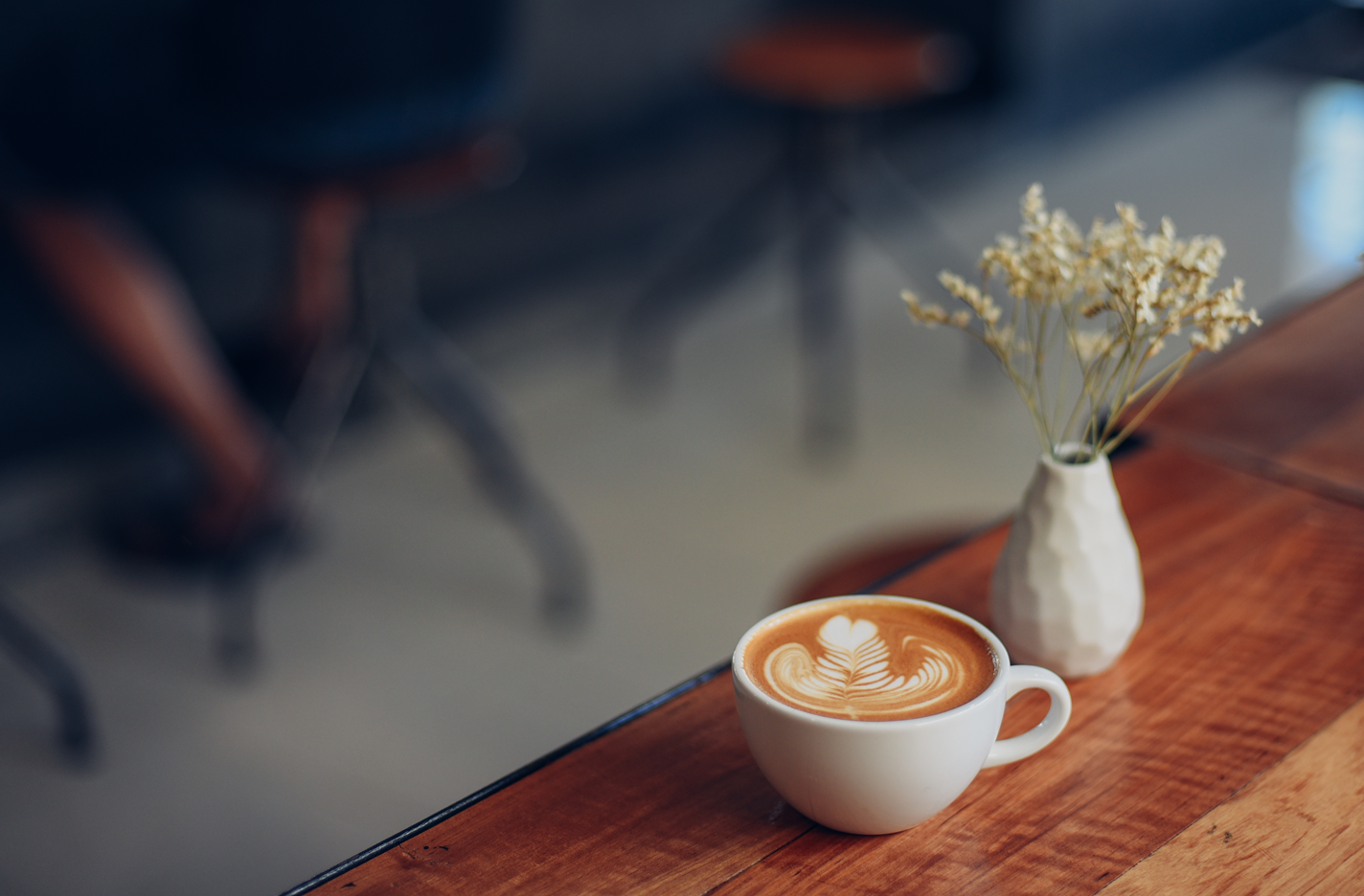 An image of a coffee cup and vase