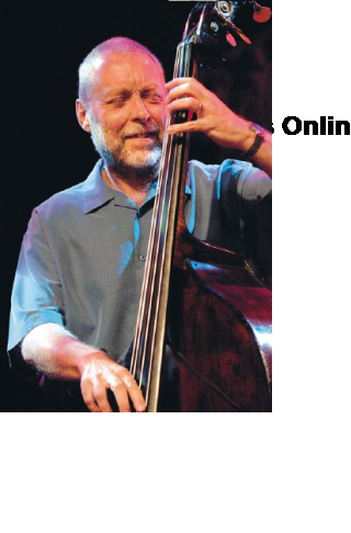 at right: Dave Holland, 2005. Nikon D2X, 1/250 sec, f/2.8, ISO 1600, 130 mm